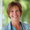 Portrait of Jennifer L., 45, Healthcare Worker, looking vibrant and healthy.